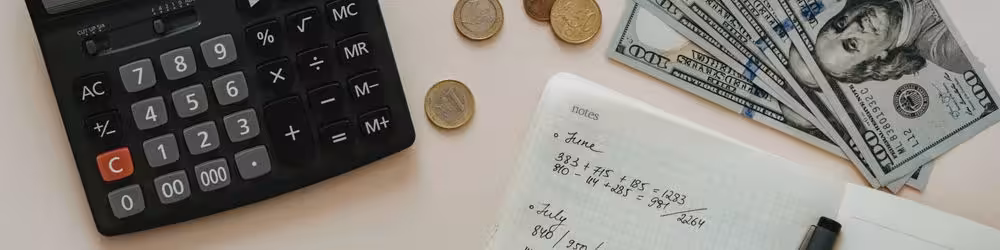 A calculator, some cash and a notepad, all making you realise you wasted your shots